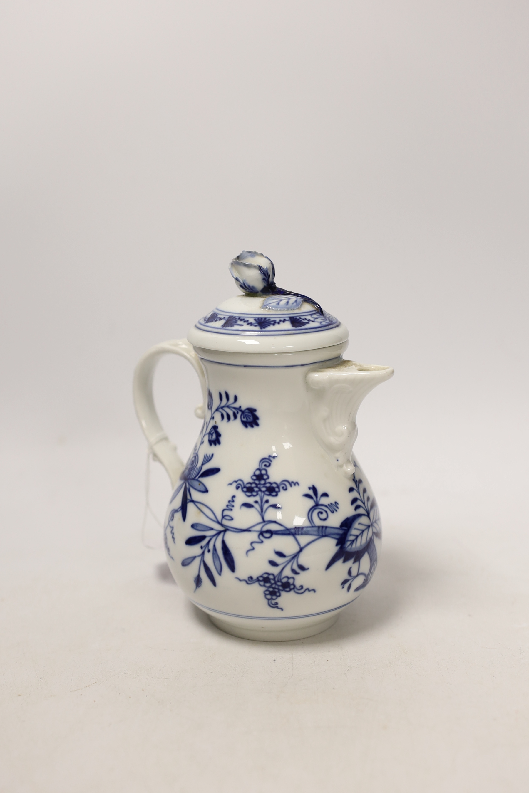 Fourteen Meissen items including a coffee pot, five cups and saucers, a square dish and oval dish, and a posy vase, coffee pot 16cm
